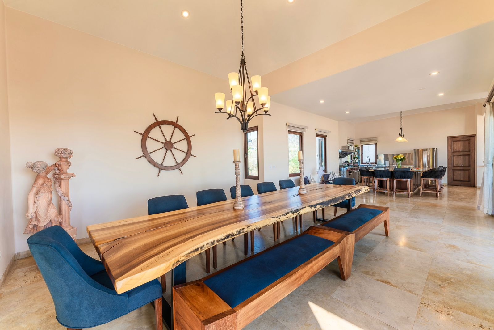 Villa Fuego — Dining room with Parota wood table and blue chairs